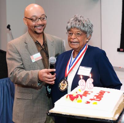 Earl Ijames, Curator of African American History, with Millie Dunn Veasy on her 96th birthday.