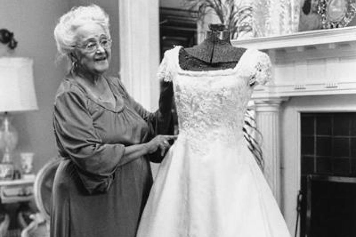 Willie Otey with one of her dresses
