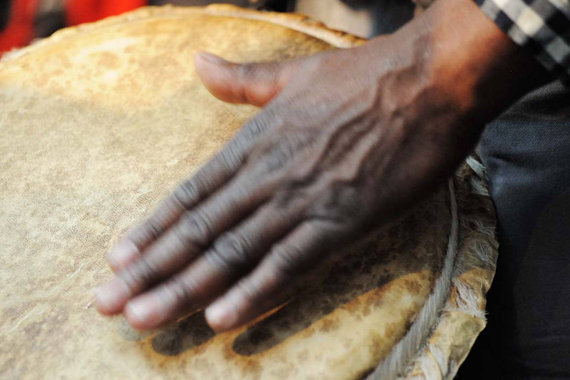 Hand on drum.