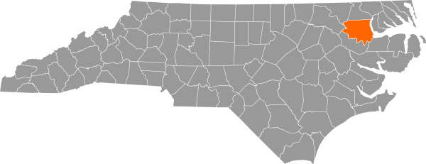 A gray map of North Carolina with Bertie County filled in with orange.
