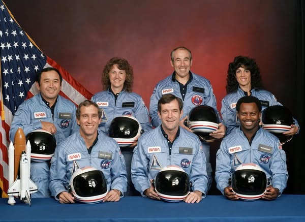 Official NASA portrait of the Space Shuttle Challenger crew, details follow in caption